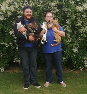 Shannon, Tom and their cats 